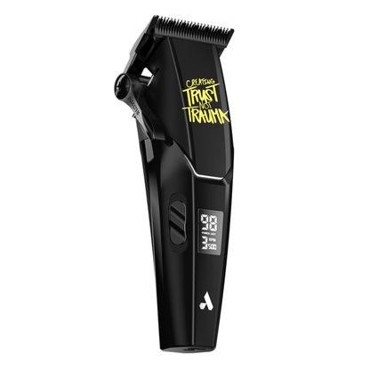 side view of Black hair clipper with digital display  with yellow text "CREATING TRUST NOT TRAUMA" on a white background