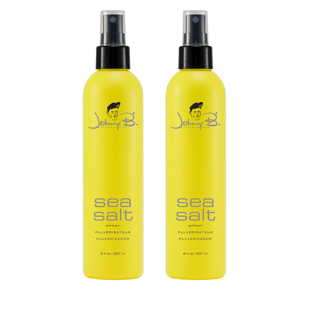 Two Yellow bottles side by side that reads Johnny B Sea Salt spray with a black pump sprayer and clear pump lid on a white background