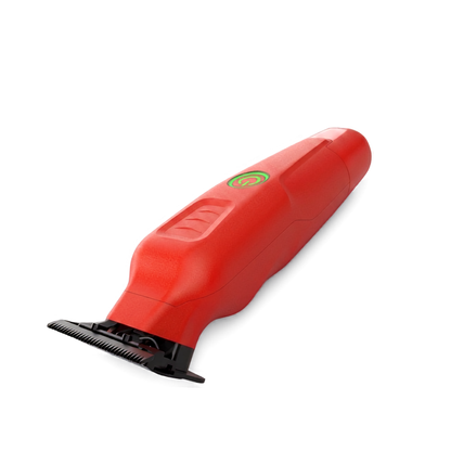 Red hair clipper on a white background