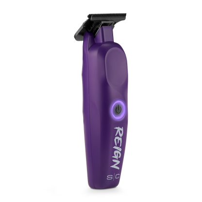 Purple hair trimmer with 'Reign' branding on a white background