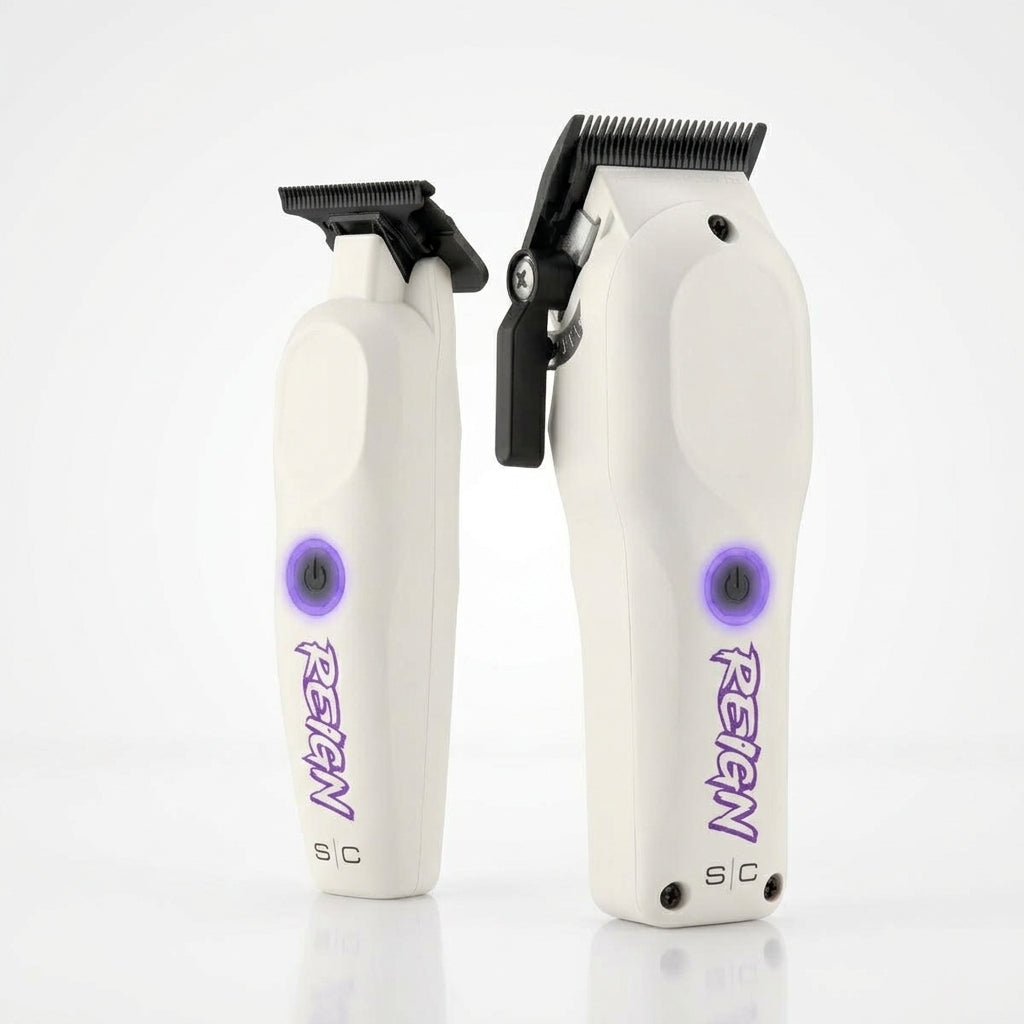 Two white REIGN clipper grooming tools on a clean white background, one standing vertically and the other open, both showing the REIGN branding and black cutting heads.