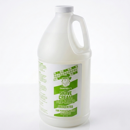 A large white plastic jug of Campbell's Shave Cream Pre-Mixed Unscented, featuring a white and green label with a cow logo, set against a plain white background.